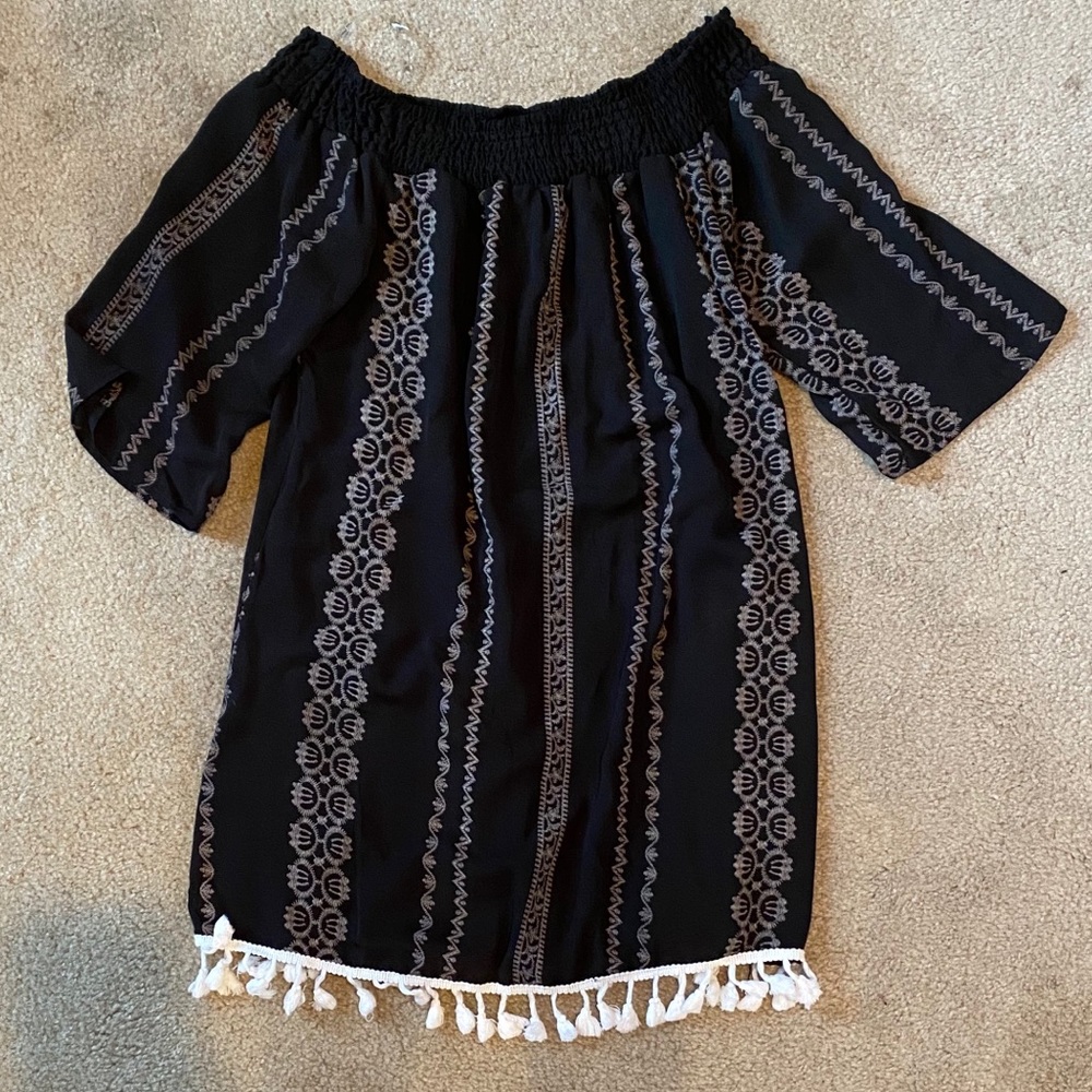 Off the shoulder dress.